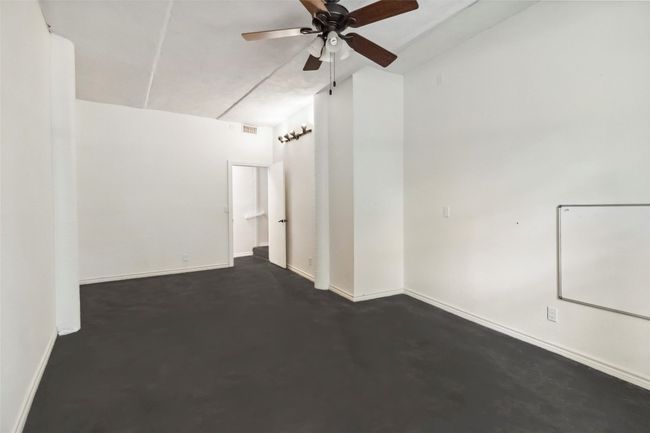 Spare room featuring baseboards and a ceiling fan | Image 15