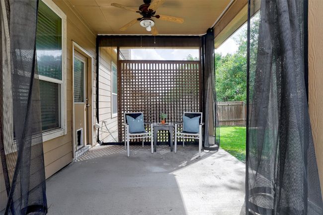 View of patio featuring a ceiling fan | Image 36