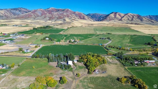 Drone / aerial view with a water and mountain view and a rural view | Image 66