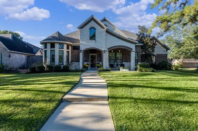 Your guest will be in awe walking up the sidewalk to this amazing home! | Image 2