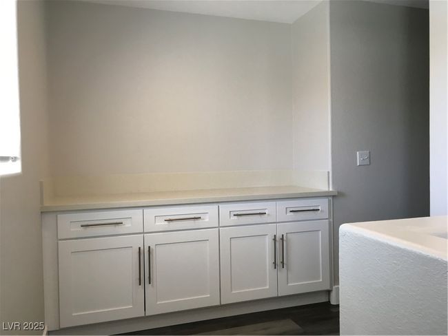 Room details featuring wood finished floors | Image 14