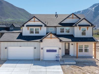 View of front of house with a garage and a mountain view | Image 1