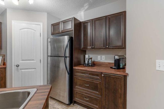 104 - 90 Panatella Landing Nw, Home with 2 bedrooms, 1 bathrooms and 1 parking in Calgary AB | Image 8