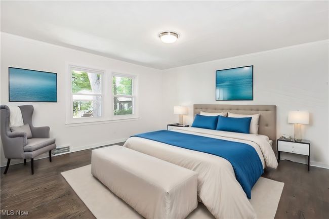 Bedroom featuring crown molding and dark hardwood / wood-style floors | Image 22