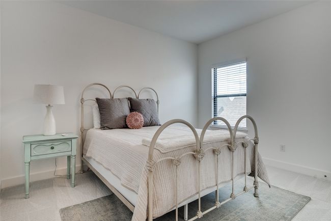 Bedroom with carpet and baseboards | Image 11
