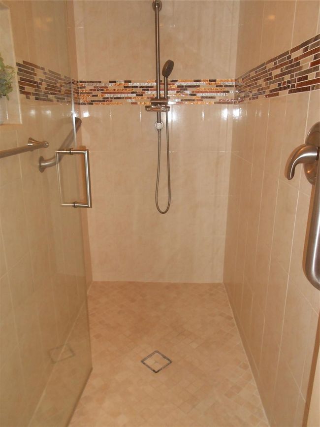 Beautiful Shower with Glass Tile Inset, Frameless Shower Door | Image 30