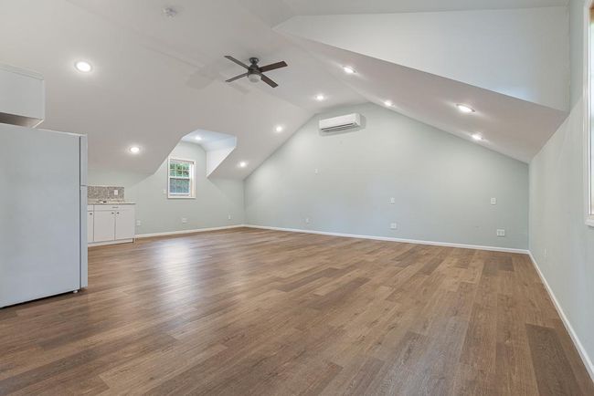 Discover a completely functional loft space above the attached garage! | Image 29