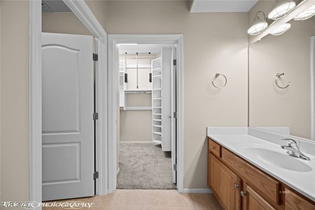 Bathroom featuring tile patterned floors and vanity | Image 27