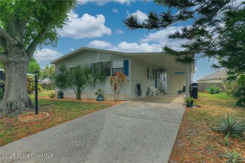 104 Caladium Ct, Barefoot Bay, FL, 32976-7617 | Card Image