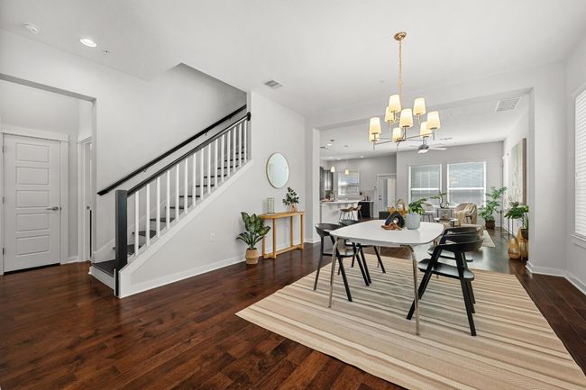 As you step through the front door, the dining area greets you with its open, airy feel—perfect for gatherings or quiet meals alike | Image 4