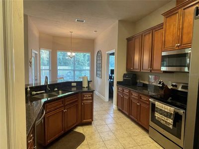 14408 Nw 31 Road, House other with 4 bedrooms, 3 bathrooms and null parking in Newberry FL | Image 3