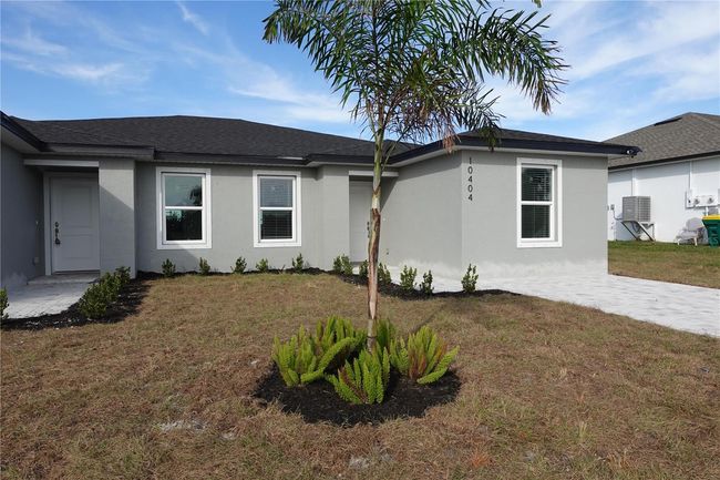 12223 Kirk Ave, Home with 6 bedrooms, 4 bathrooms and null parking in Port Charlotte FL | Image 4
