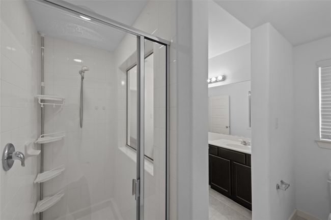Full bath featuring vanity and a stall shower | Image 21