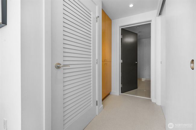 Hall way with closets to primary bathroom | Image 22