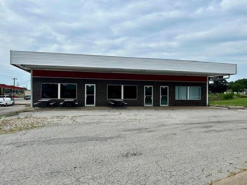 409 W Pine St, Raymore, MO, 64083-9075 | Card Image