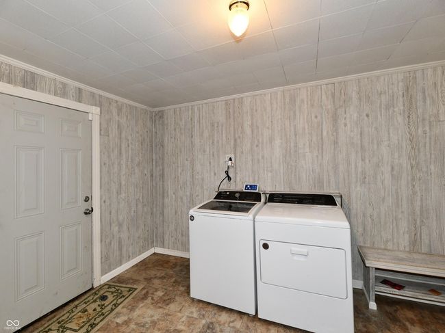Laundry room, door to the left opens out to the back yard. | Image 19