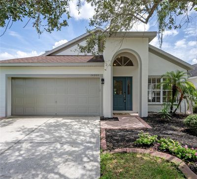 10203 Woodford Bridge Street, House other with 4 bedrooms, 2 bathrooms and null parking in Tampa FL | Image 1