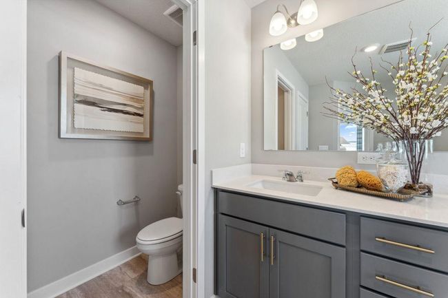 Private water closet in the primary suite. Photo of model home, colors and finishes will vary. | Image 28