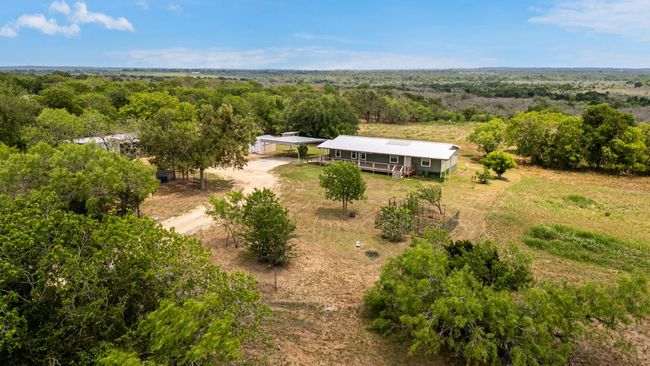 Overview of rural landscape featuring a forest | Image 32