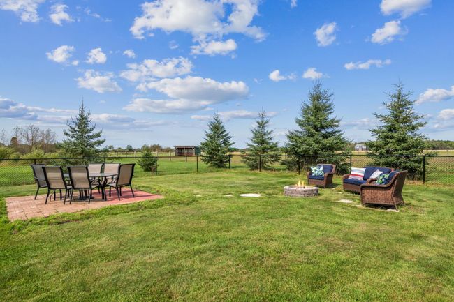 Patio and firepit area | Image 44