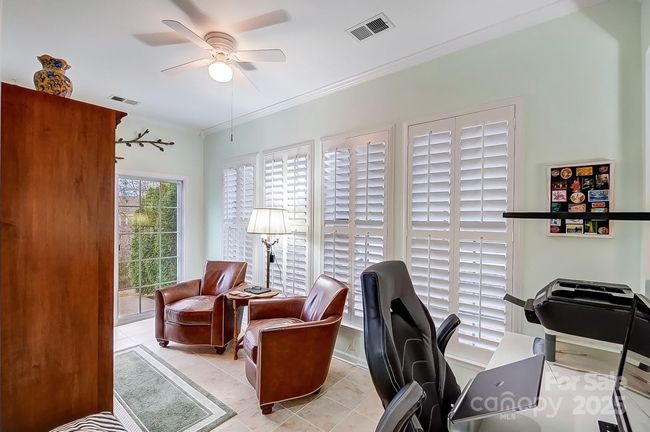 Sun room used as den | Image 22