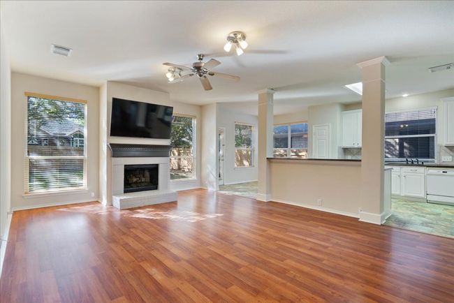 Living room with view of kitchen and bar arrea | Image 17