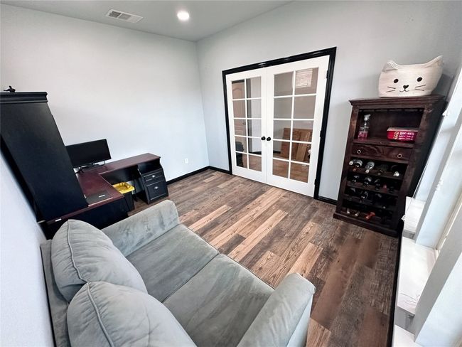 Front entryway room with french doors, can be a second living area, game room, office, or other | Image 6
