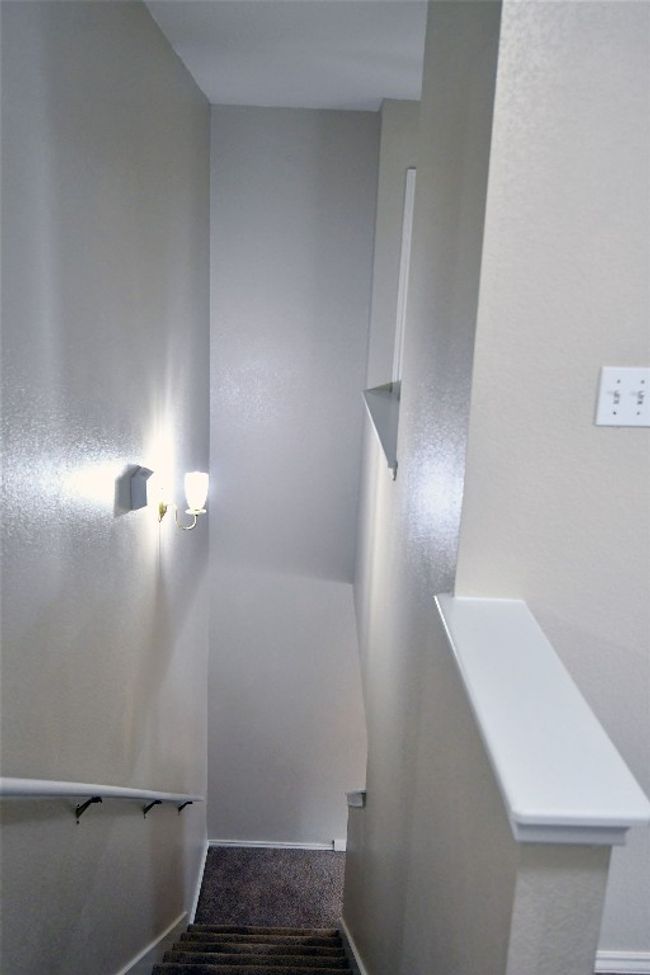 Stairs featuring carpet and baseboards | Image 12
