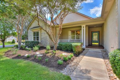 Level lot with easy access to the front door, large inviting front porch welcomes you to this delightful home. | Image 3