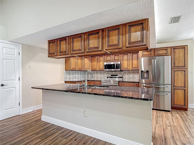 Double sided upper cabinets | Image 44