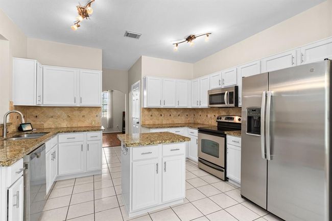25807 Oakridge Forest Ln, House other with 4 bedrooms, 3 bathrooms and 2 parking in Spring TX | Image 9