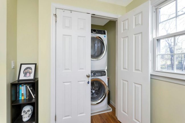 Fourth bedroom with updated washer/dryer in closet. | Image 21