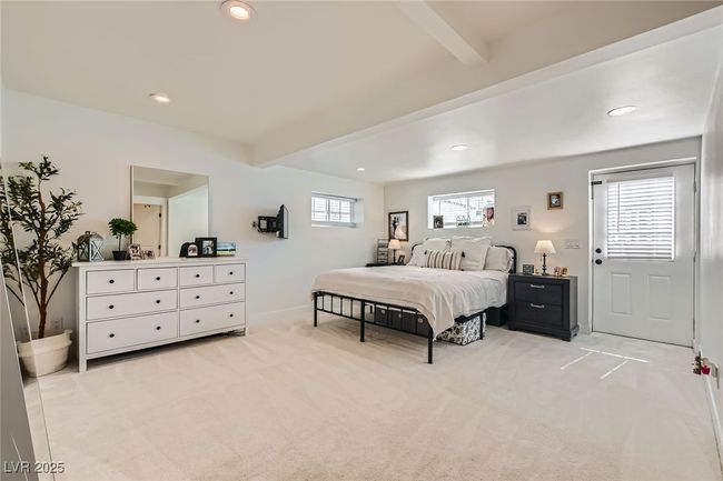 Bedroom with beam ceiling, light carpet, recessed lighting, and baseboards | Image 19