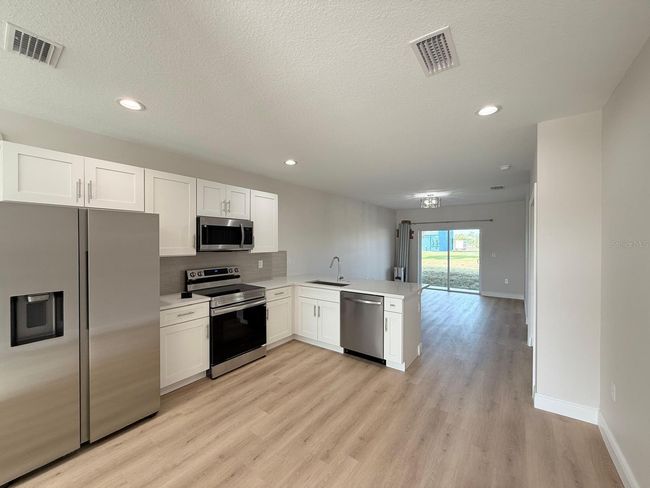 12223 Kirk Ave, Home with 6 bedrooms, 4 bathrooms and null parking in Port Charlotte FL | Image 20