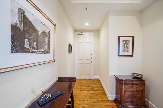 This charming foyer will fit your storage or display needs perfectly and a coat closet is just out of view. | Image 32