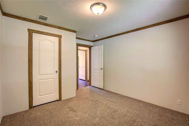 Unfurnished bedroom featuring carpet flooring | Image 22