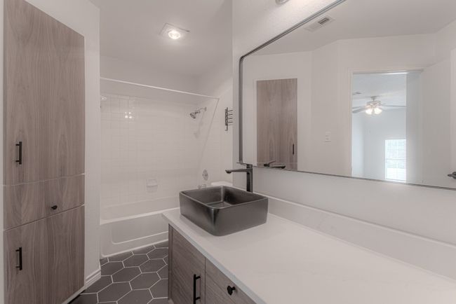The second of two full bathrooms | Image 19