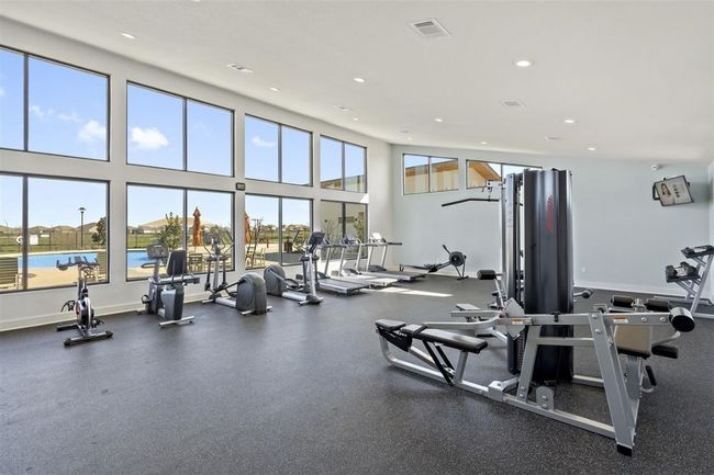 Workout area with visible vents and recessed lighting | Image 32