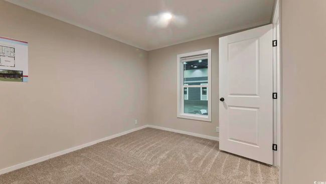 Unfurnished room featuring light colored carpet and baseboards | Image 29