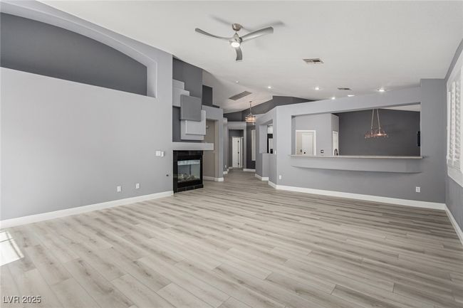 Great Room, ceiling fan and vaulted ceiling | Image 7