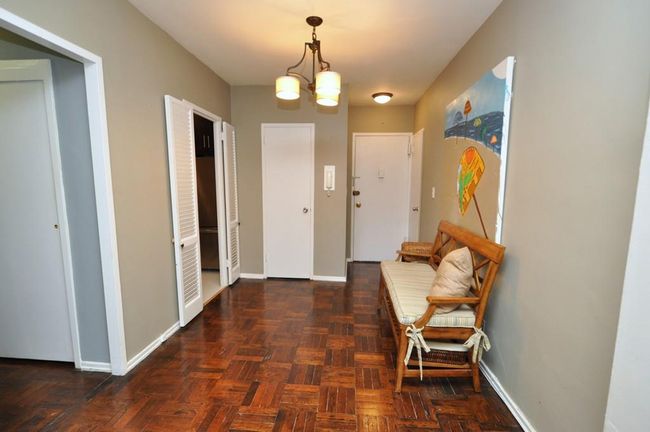 Dining Foyer featuring baseboards and a notable chandelier | Image 22