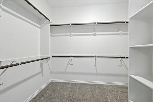 Spacious closet featuring carpet floors | Image 20