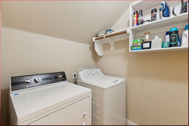 Laundry room featuring separate washer and dryer | Image 11