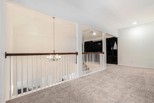 As you come up the classic style staircase, you could either enter the media room or come into this bright and airy game room! | Image 24