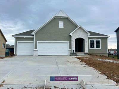 View of front of house with a garage | Image 1