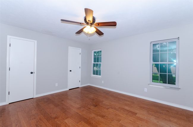Gameroom featuring wood finished floors and ceiling fan | Image 20