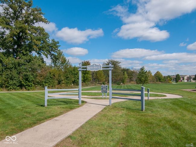 view of home's community with a yard | Image 13