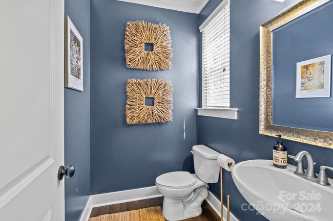 Main level half bathroom | Image 8