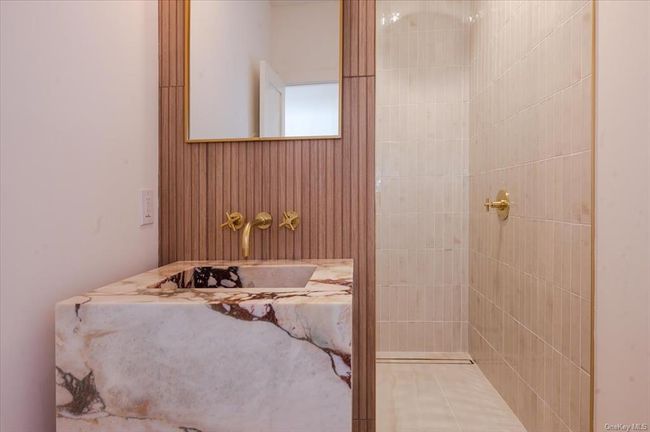 Full bathroom featuring tiled shower | Image 22