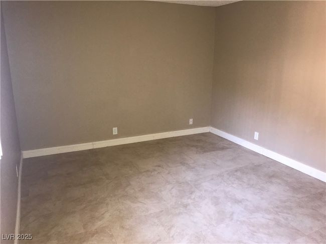 Empty room featuring baseboards | Image 7